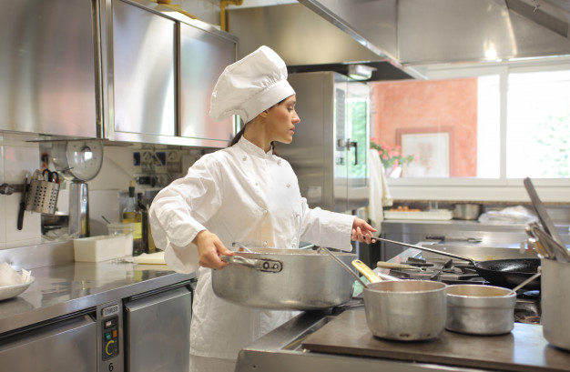 female-chef-working-kitchen_102671-4313 female chef working kitchen 102671 4313