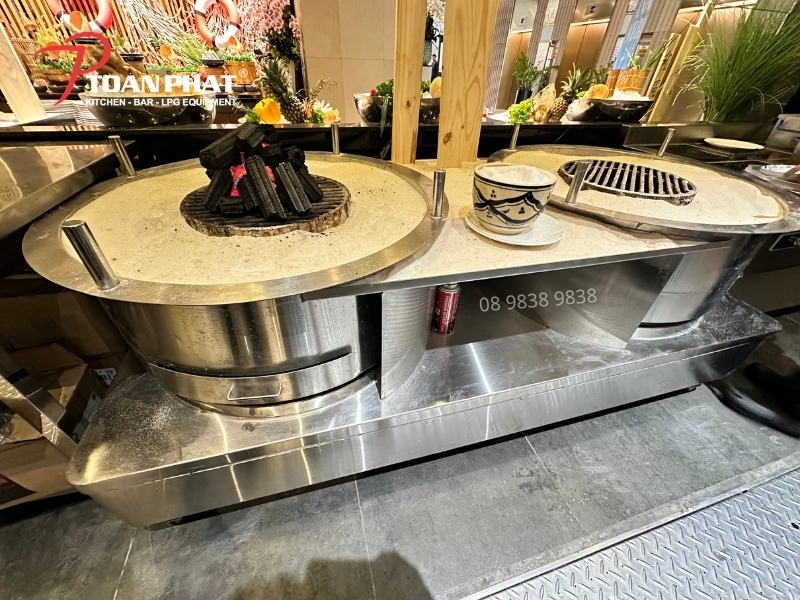 BẾP NƯỚNG CÁT DÙNG THAN 12 Bếp nướng cát dùng than Toàn Phát cung cấp cho nhà hàng Buffet Cửu Vân Long tòa nhà Marina